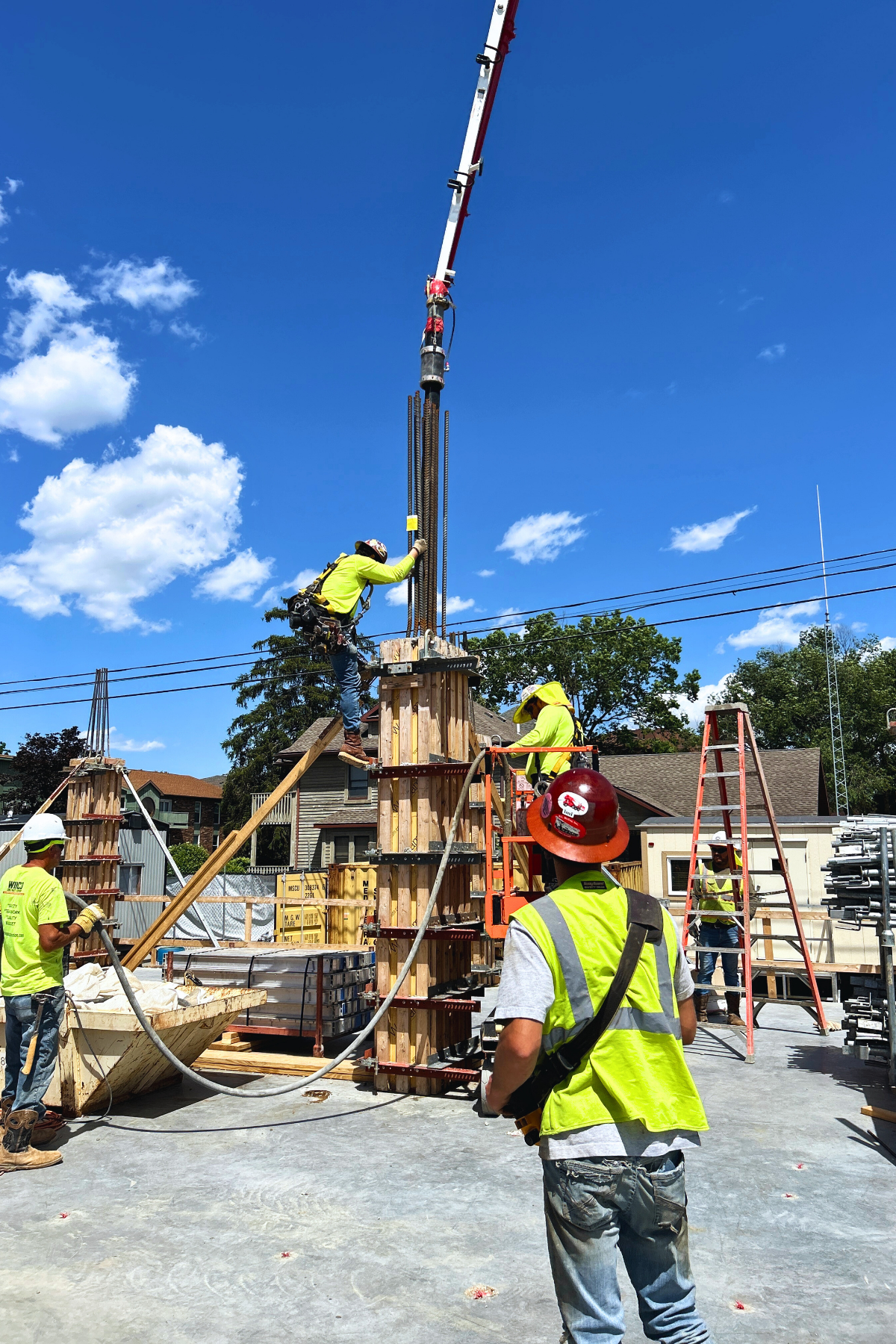 West Lafayette, IN commercial building having concrete poured into it via a machine courtesy of Tipp-Mont Concrete Pumping